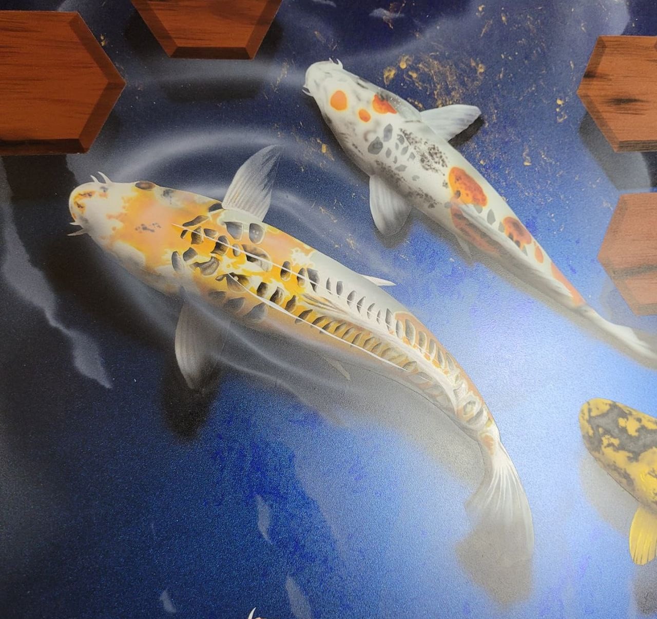 Airbrushed Painting of Koi Fish on Blue Background with water ripples